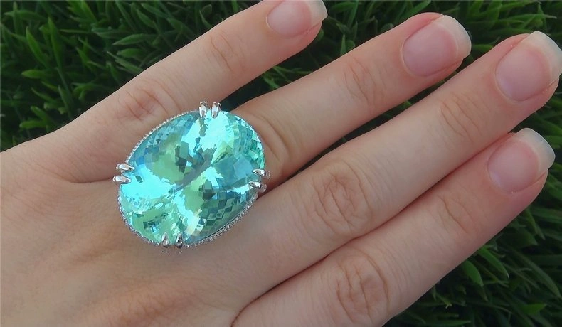 Paraíba Tourmaline gemstone with vivid neon blue color