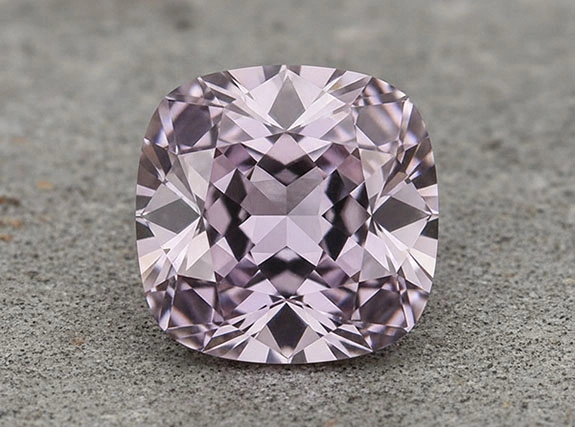 Rare Taaffeite gemstone with a soft pink to violet color